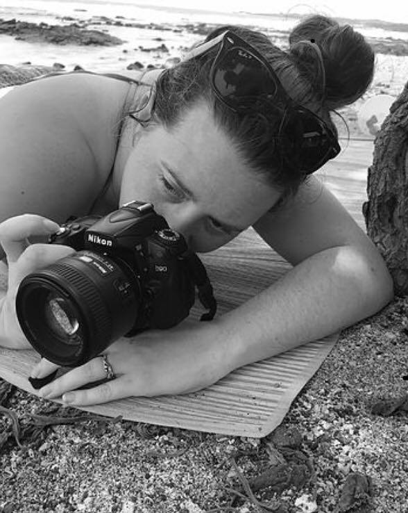 Brooke Ratzat Photography taking a picture on the beach